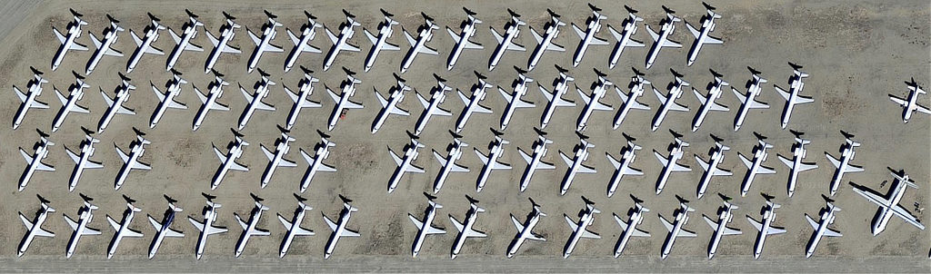Close up aerial view of Kingman Airport with airliners in storage (Google Maps - 2022)